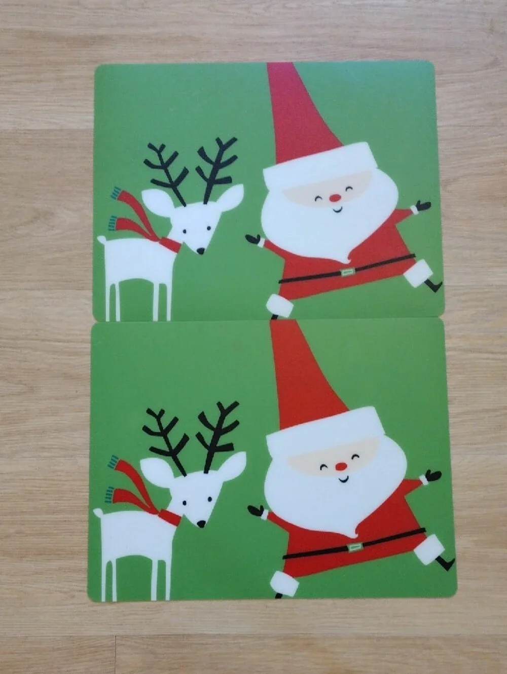 Target 2011 Christmas Holiday Placemats Set of 6 Santa Snowman Penguin 14 x 18